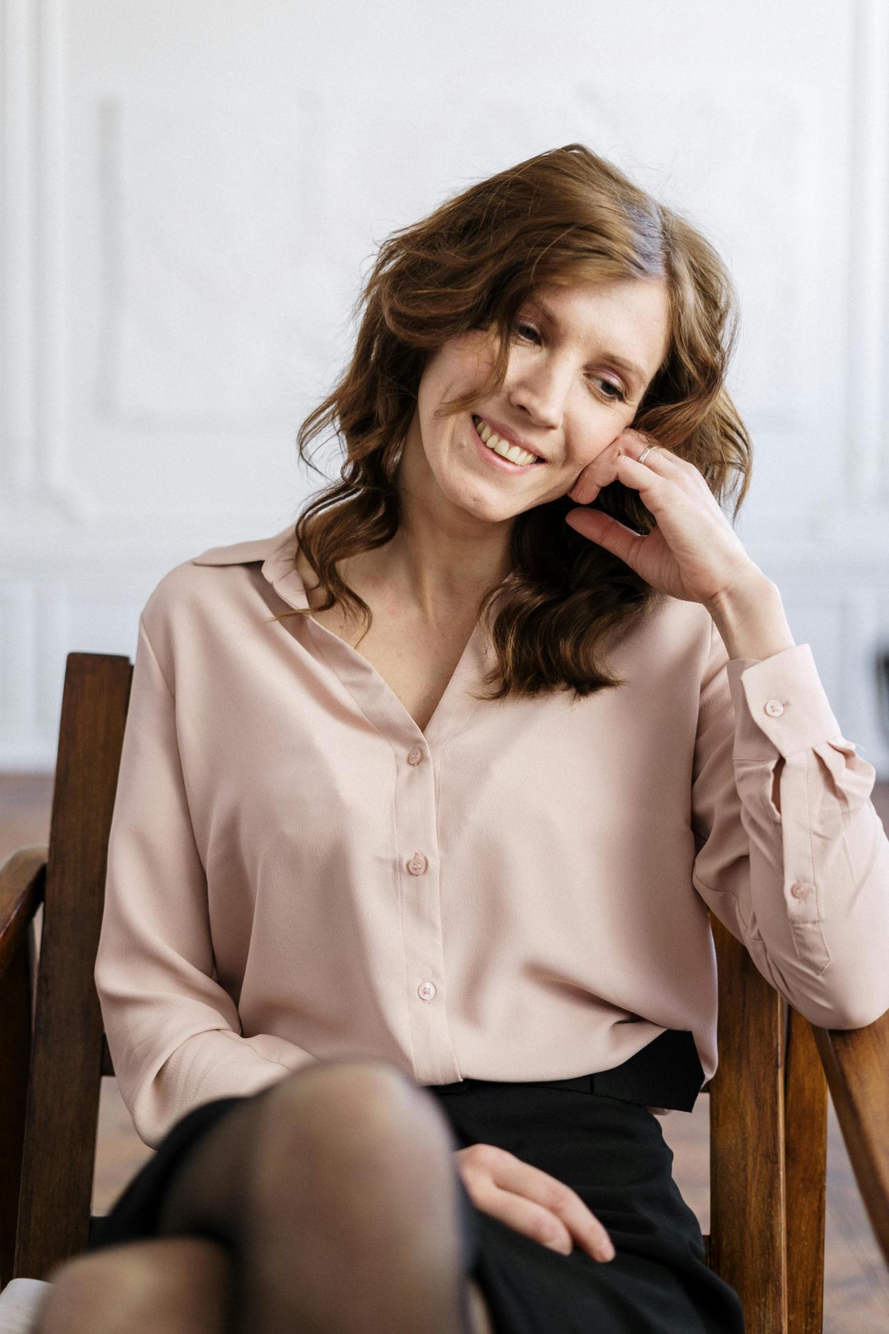 Smiling woman in elegant attire