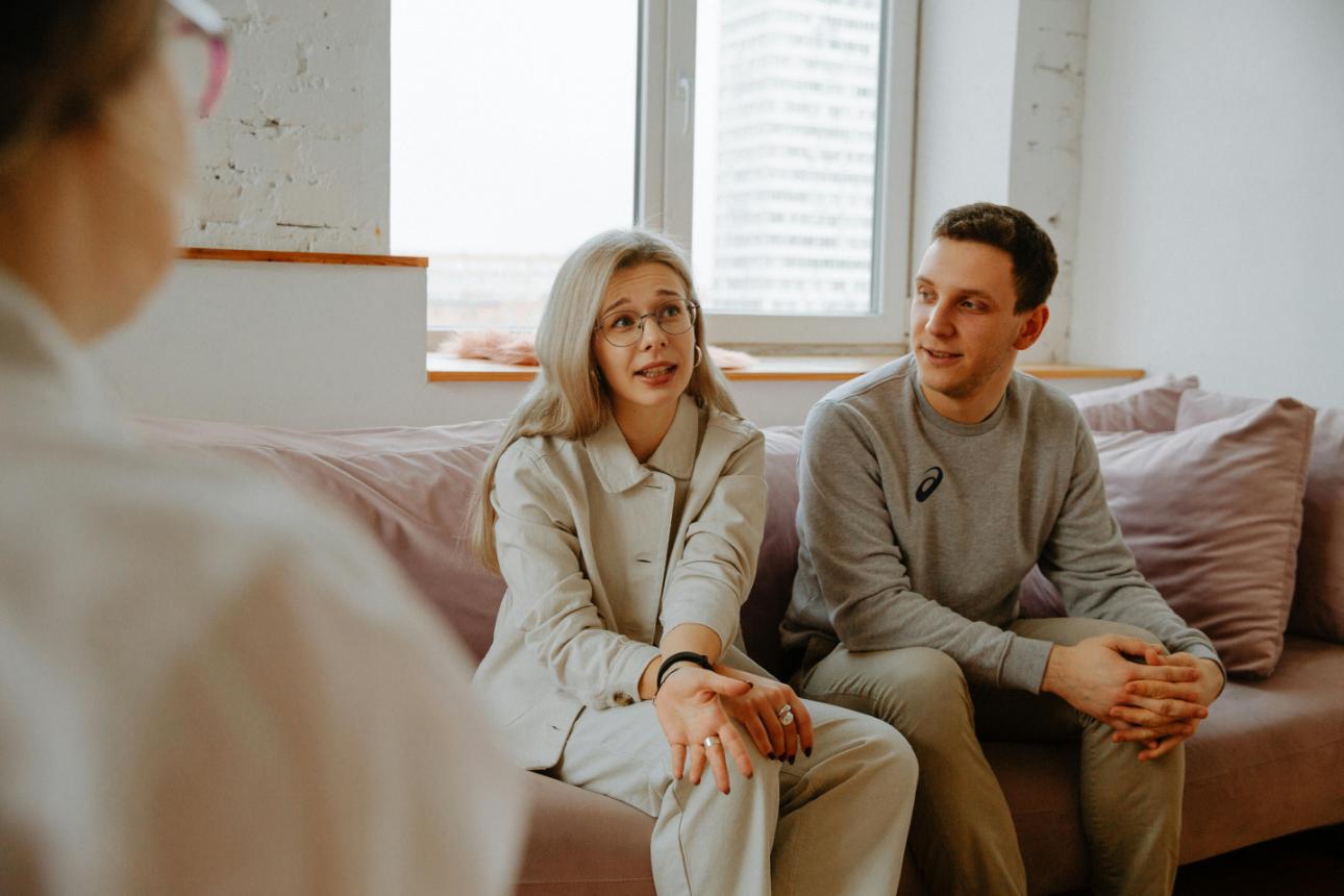 Two people engaged in conversation